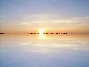 Scenic view of sea at sunset