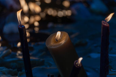 Close-up of illuminated candle