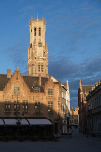 View of buildings in city against sky