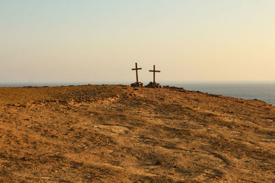 Evening landscapes  with cross of paracas national reserve park, peru