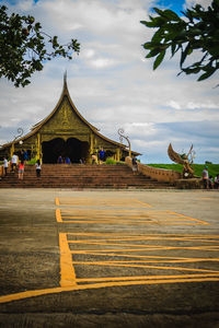 View of temple against cloudy sky