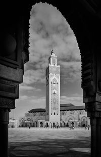 Low angle view of mosque hassan ii against sky