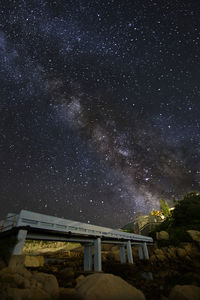 Low angle view of stars against sky at night
