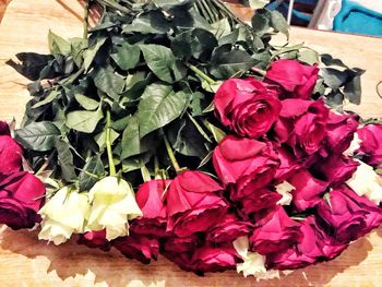 Close-up of pink roses on table