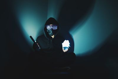 Portrait of young man using mobile phone