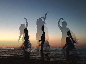 Multiple image of silhouette young woman at beach during sunset