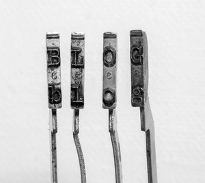 Close-up of telephone booth against white background