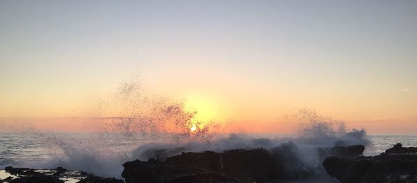 Scenic view of sea during sunset