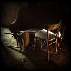 Empty chairs in old room