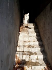 Staircase by wall