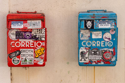 Close-up of information sign on wall