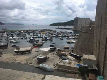 High angle view of boats moored in harbor