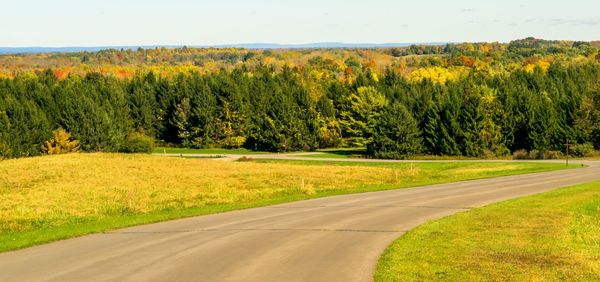 Road passing through field