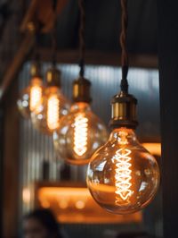 Close-up of illuminated light bulb