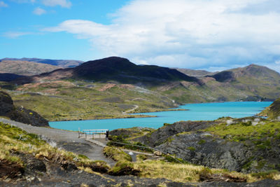 Scenic view of landscape and mountains against sky