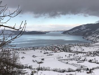 Scenic view of sea against sky during winter