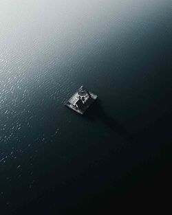 High angle view of ship sailing in sea