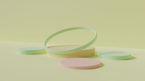 Close-up of spoon on table against white background