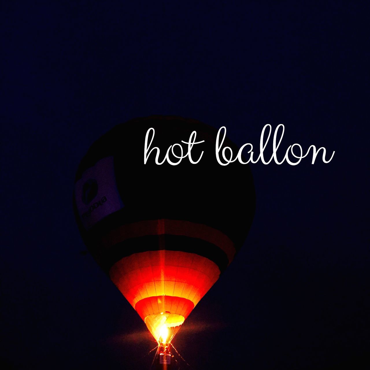 copy space, illuminated, low angle view, clear sky, night, lighting equipment, communication, blue, sky, hot air balloon, travel, outdoors, silhouette, no people, guidance, electric light, transportation, dusk, text, glowing