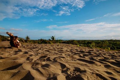 Scenic view of beach against sky