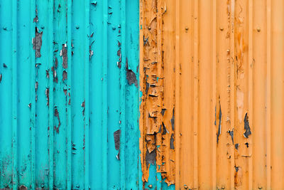 Full frame shot of weathered wooden door