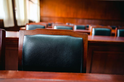 Close-up of empty seats on table