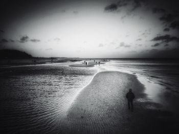 Scenic view of sea against sky at dusk