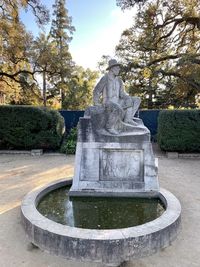 Statue of fountain in park