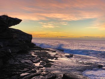 Scenic view of sea against sky during sunset