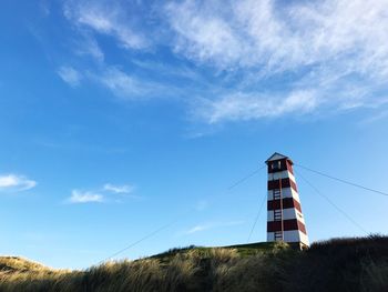Low angle view of lighthouse against sky