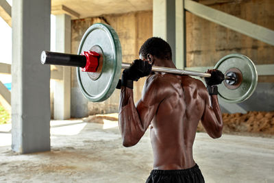 Man exercising in gym