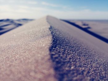 Close-up of snow on road