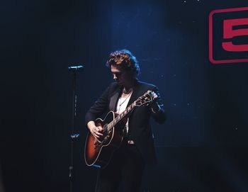 Young man playing guitar