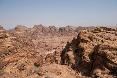 Rock formations in desert against sky