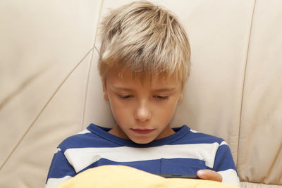 Portrait of cute boy at home