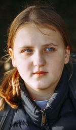 Close-up portrait of young woman