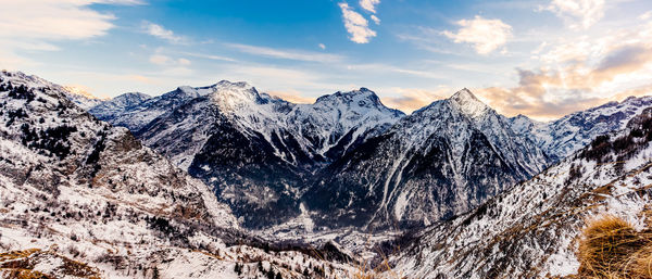 Scenic view of snowcapped mountains against sky