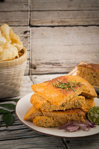 Close-up of bread in plate on table