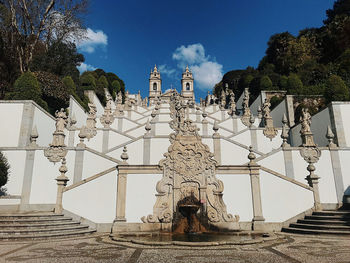 Sculpture of historic building against sky