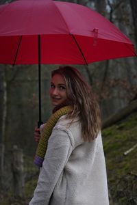 Young woman with umbrella