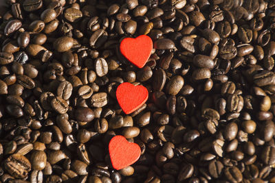 Heart shape decoration on roasted coffee beans