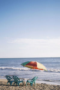 Scenic view of beach against sky