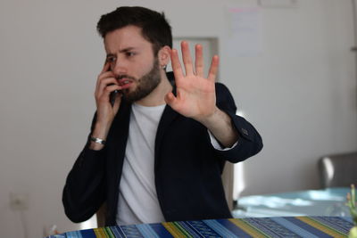 Portrait of young man looking away