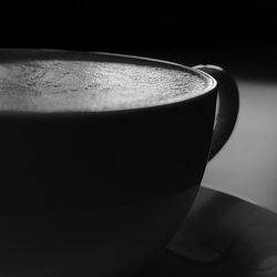 Close-up of coffee cup on table
