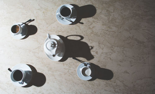 High angle view of coffee cup on table