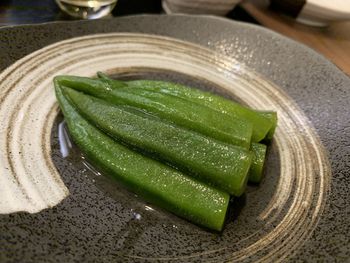 High angle view of vegetables in plate on table