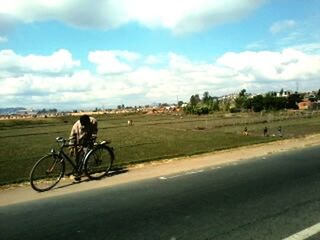 Bicycle parked on road