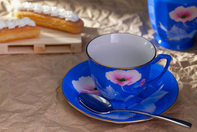 Close-up of coffee cup on table