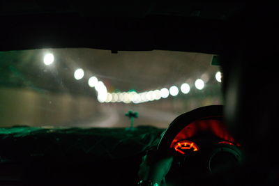 Close-up of illuminated lighting equipment in car