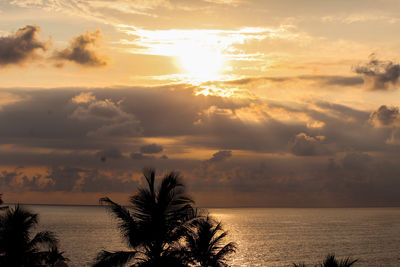 Scenic view of sea against sky at sunset